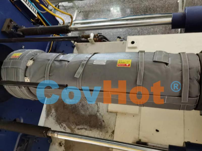 為注塑機節(jié)能“穿衣”，每年省下可觀電費——可拆卸保溫套的經(jīng)濟(jì)賬